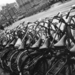 Netherlands-Amsterdam-urban-landscape-bicycles-wet-lined-up-in-c